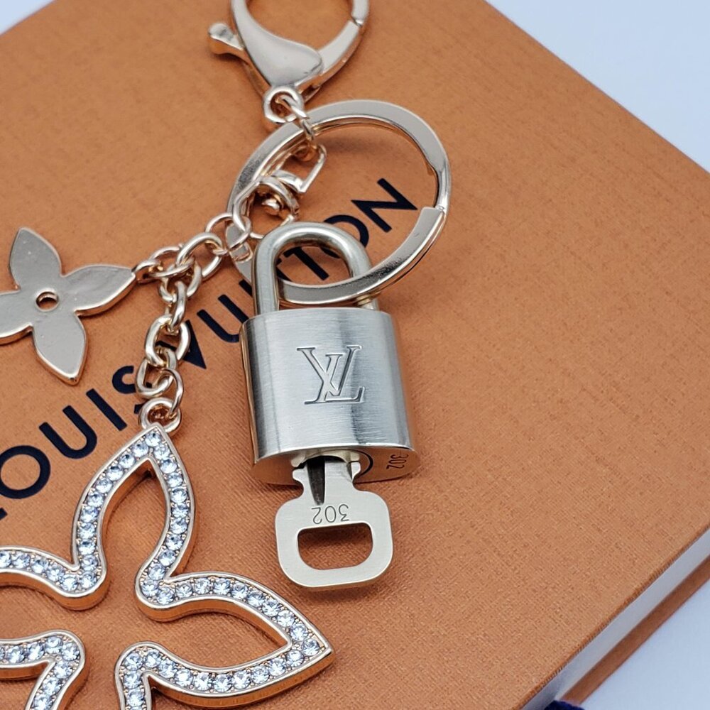 Authentic Louis Vuitton Gold Lock & Box w/ Unbranded Clover Bagcharm - Picture 3 of 9